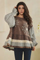 Oli and Hali Mixed Fabric Tiered Tunic Long Sleeve Top - Front view with sun embroidery