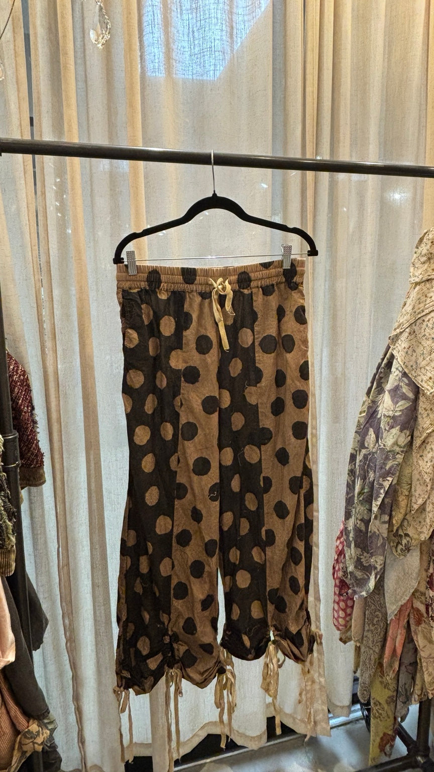 Jaded Gypsy Painted Moon Pants in Dot with contrasting brown and dark polka dot panels and gathered tie hems
