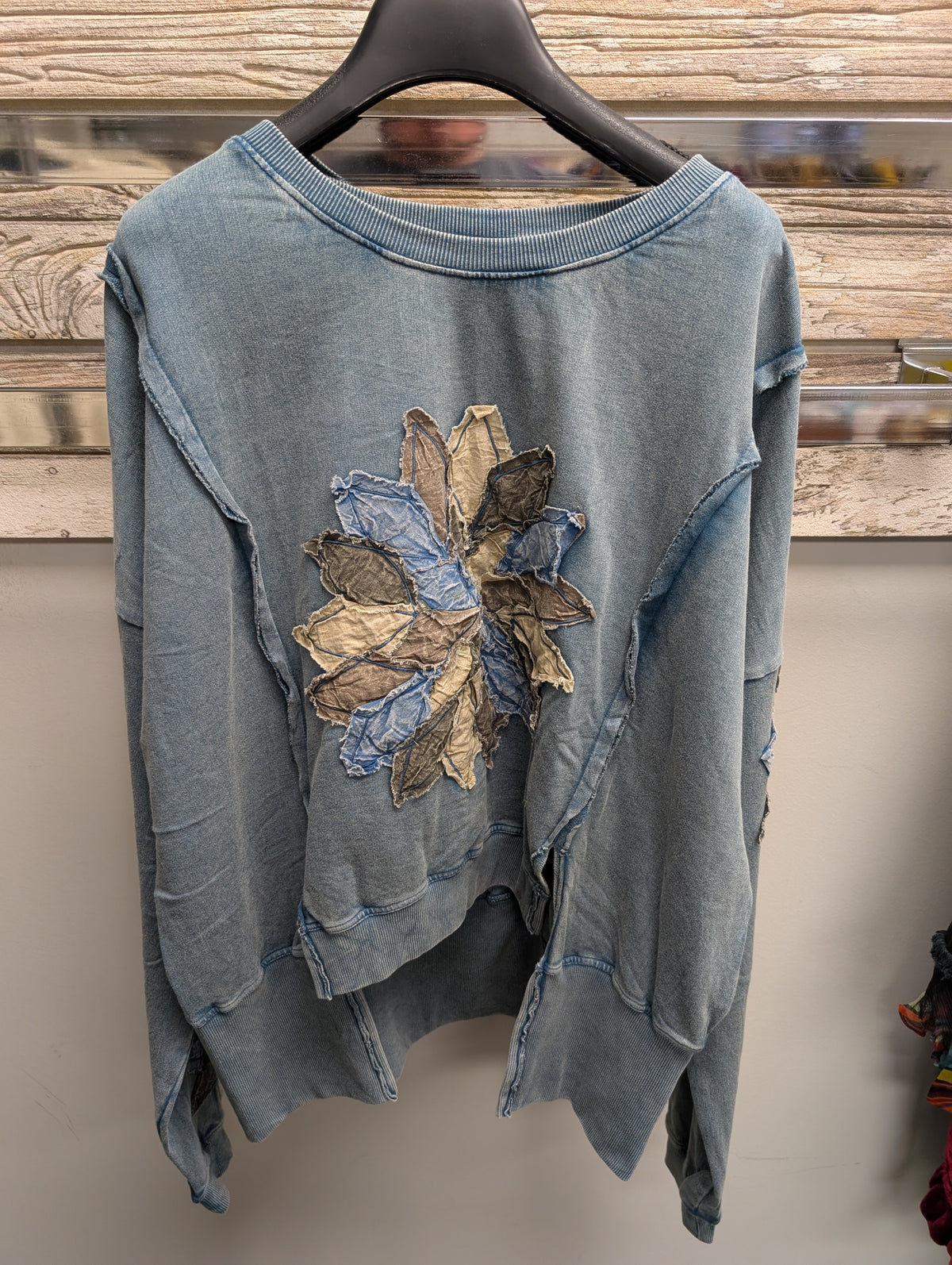 Front of Paper Lace C-818T Teal Mix flower appliqué pullover