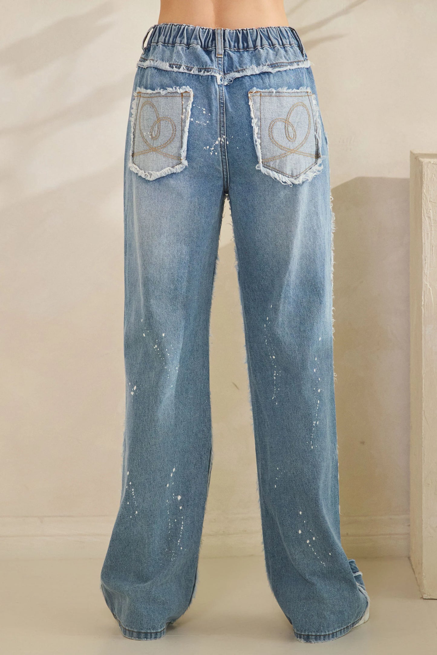 OLI AND HALI WASHED HEART CUTOUT JEANS