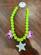 Queen Gypsy lime beaded necklace with pink horse charms and sparkling star pendant