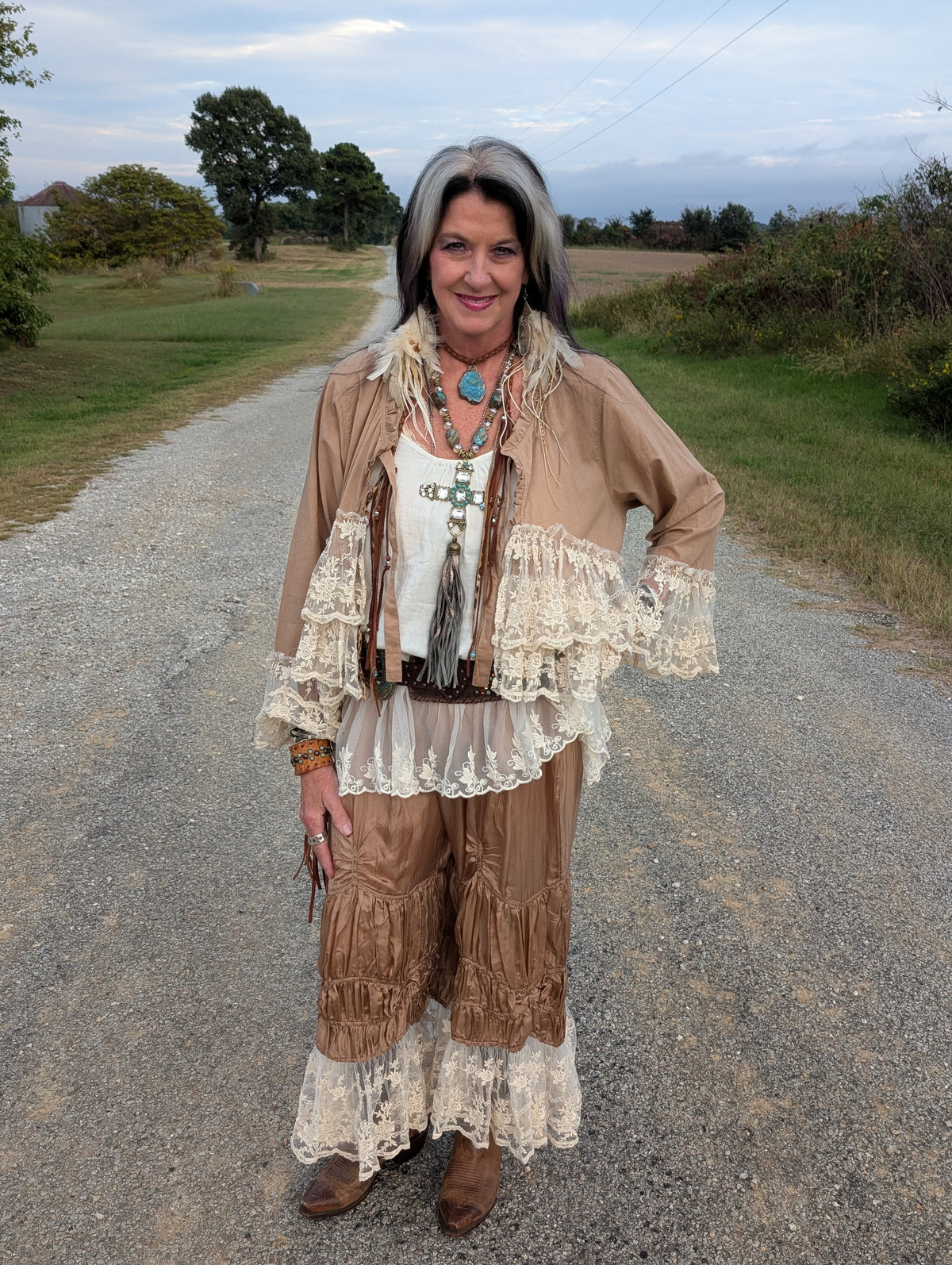 Rambling Rose Lace Jacket — Felecia Bella by paper lace, tan jacket with cream floral lace tiers and lace-trimmed sleeves, shown in a styled outfit. Jacket only.
