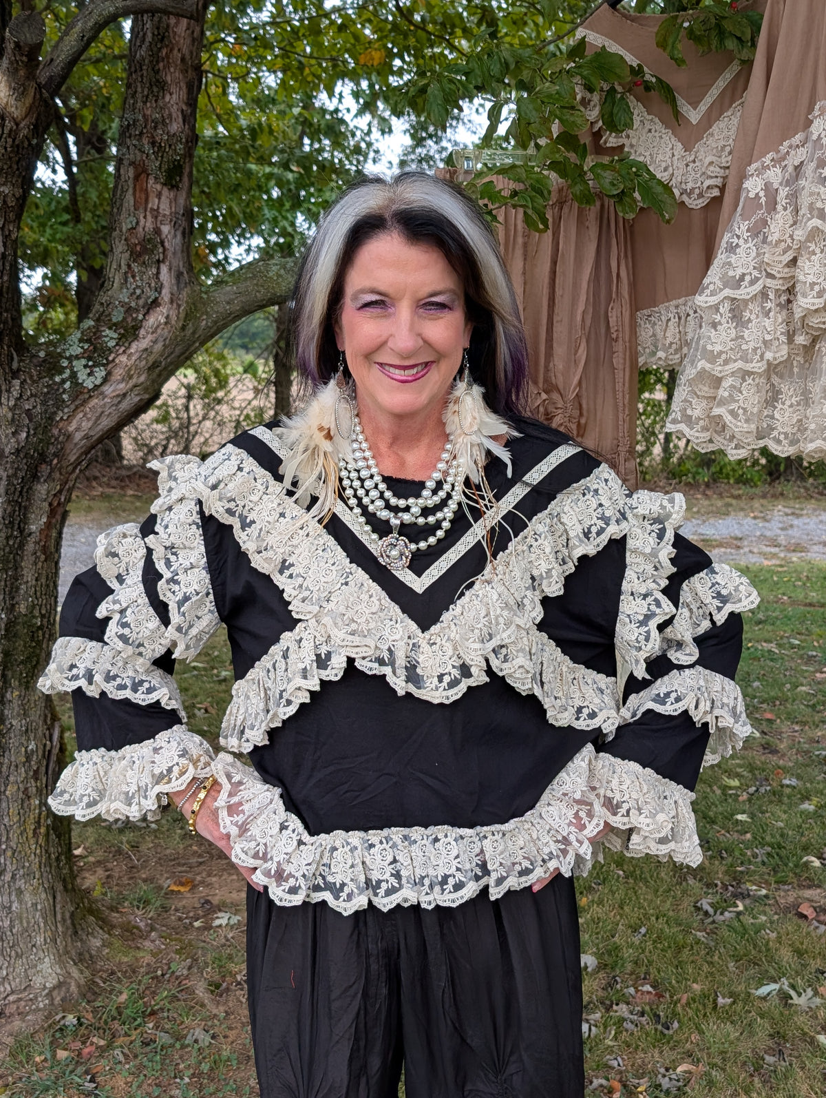 Rambling Rose Lace Top in Black — front view with light floral lace ruffles across the chest, sleeves and hem.