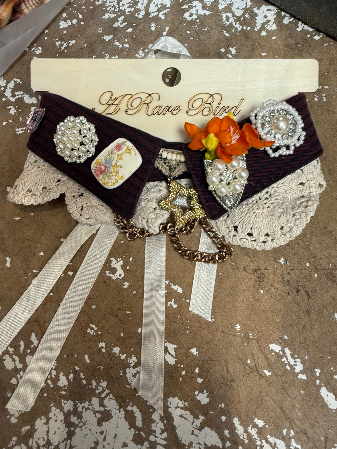 Burgundy Bloom embellished collar necklace with orange flowers, floral accent, pearl-look ornaments and cream crochet lace