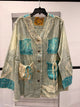 A Rare Bird turquoise star and stripe patchwork top, front