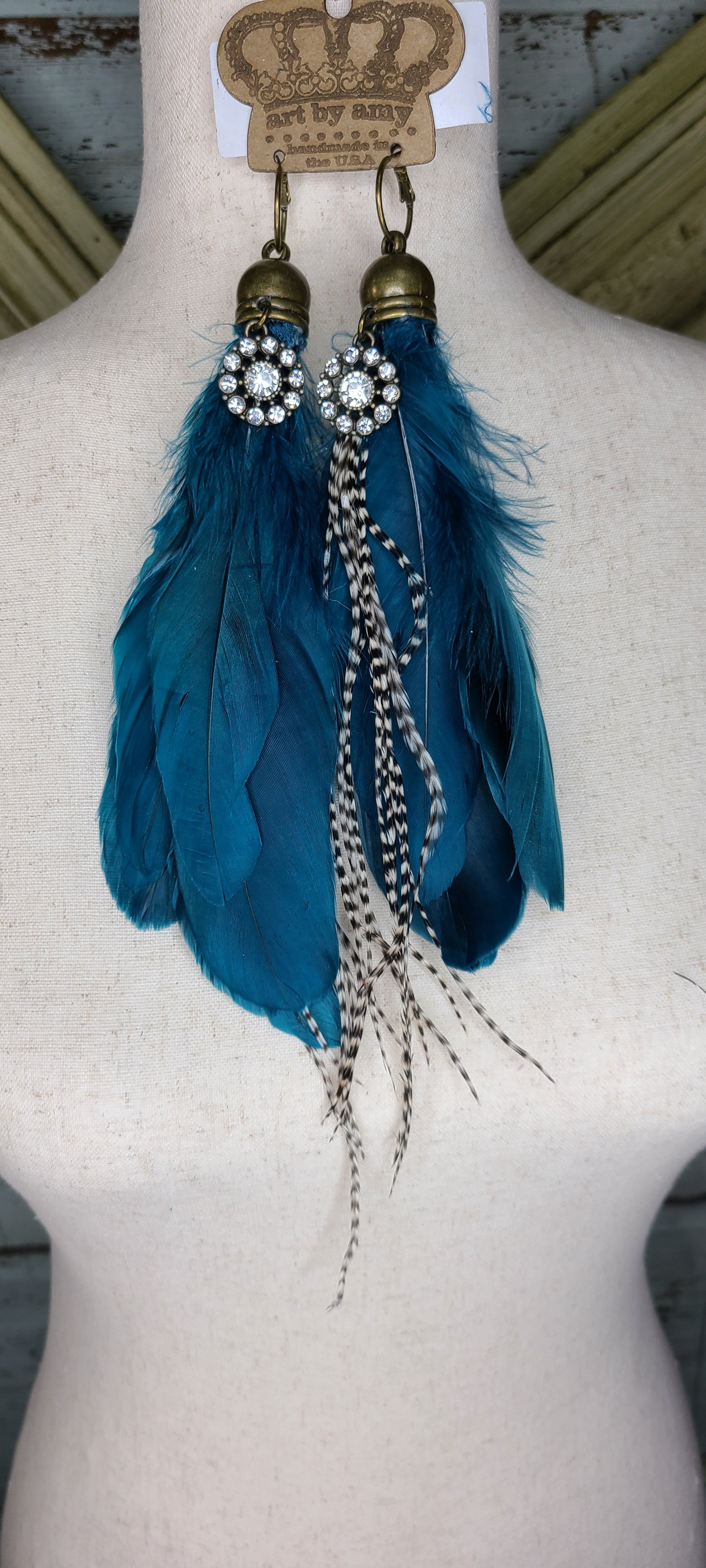 Art by Amy Turq Blue Feather ears