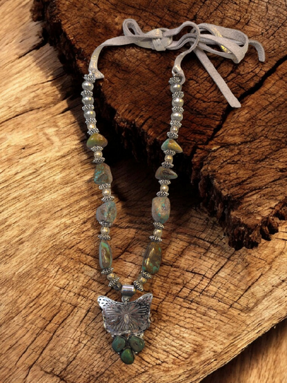 A Rare Bird Turqoise Butterfly  neckless