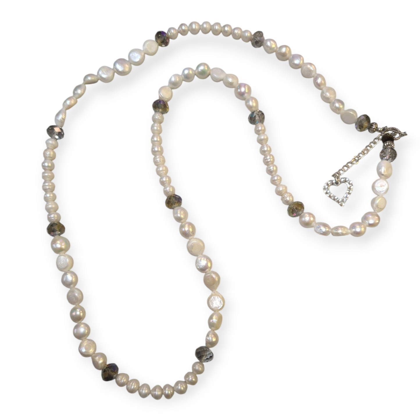 A Rare Bird Long Pearls with aget