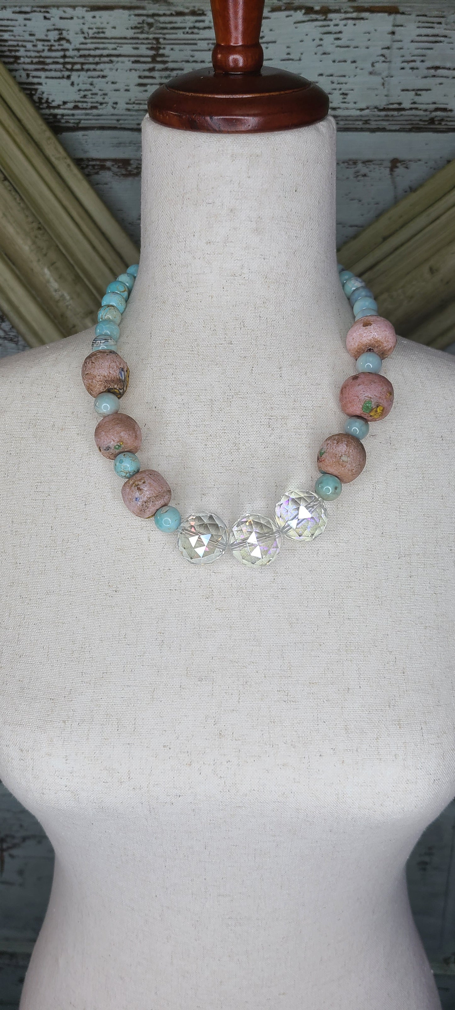 A rare Bird Truq pink and crystal Necklace
