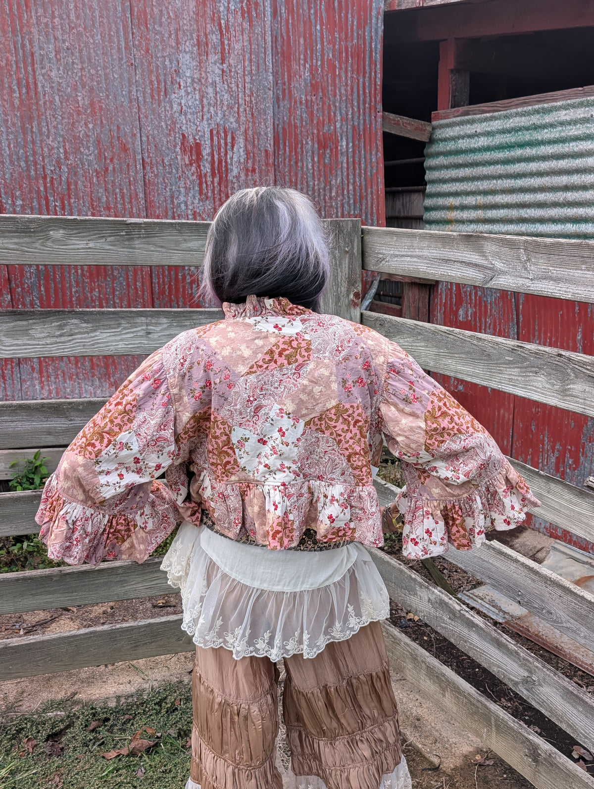 Back view of the reverse side of Rosewater Rhapsody Reversible Jacket — Felecia Bella by paper lace, showing pink and cream floral and paisley patchwork.