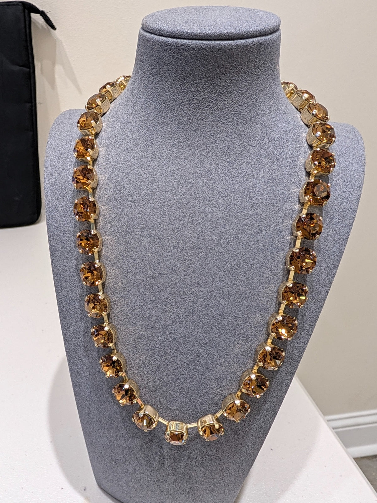 Wafa Amber Aura Crystal Necklace — solid amber-colored crystals in gold-tone settings