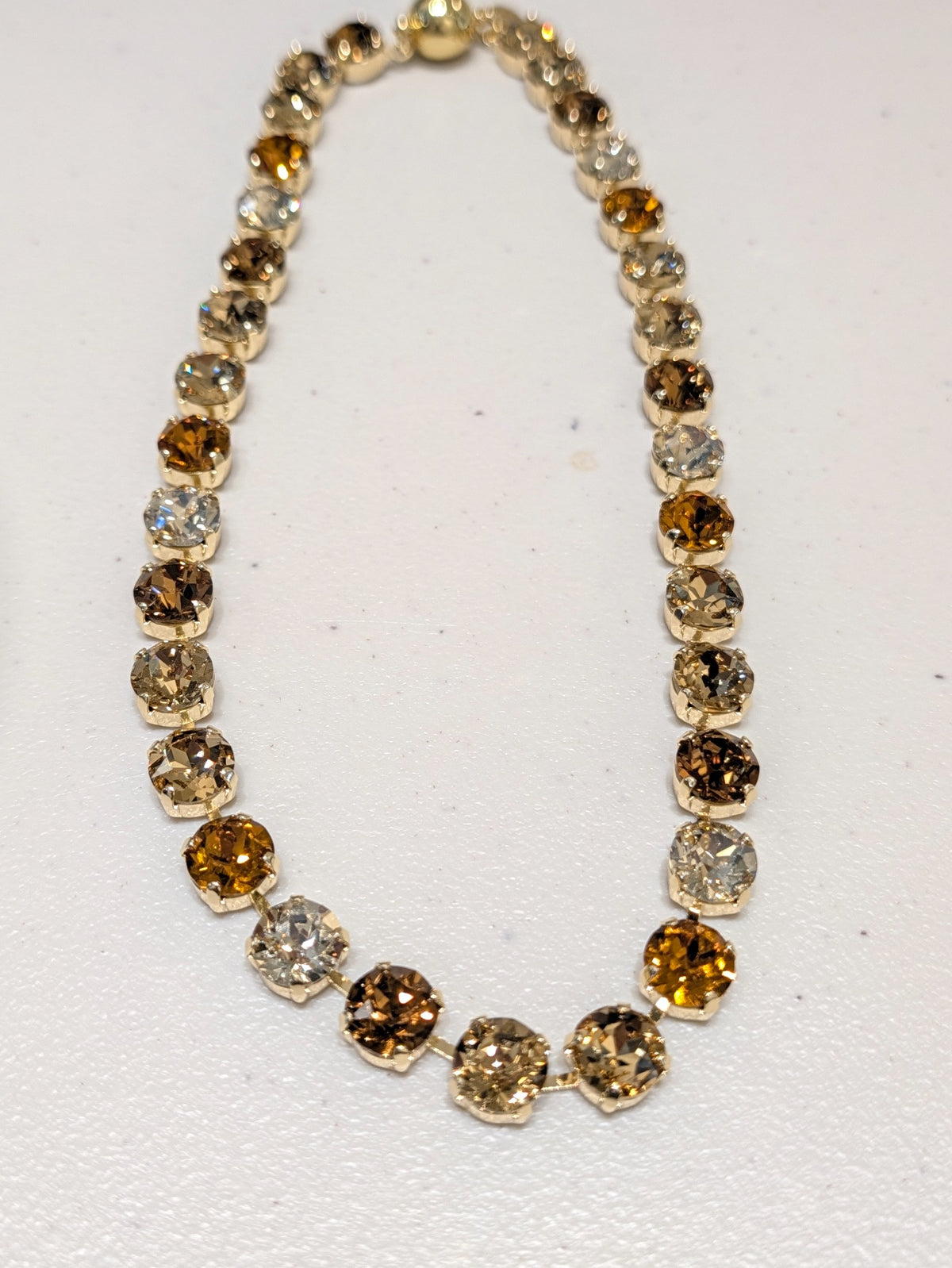 Wafa Honey Glow Crystal Necklace — amber, champagne and clear crystals in gold-tone settings