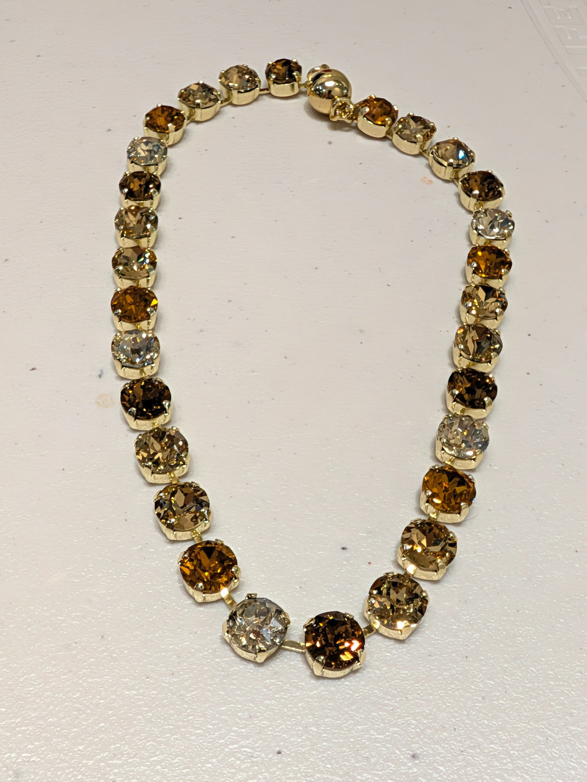 Wafa Honey Glow Crystal Necklace — amber, champagne and clear crystals in gold-tone settings