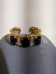 Wafa Midnight Baguette Cuff — Black/Clear, alternating black rectangular and slim clear accents on a gold-tone cuff