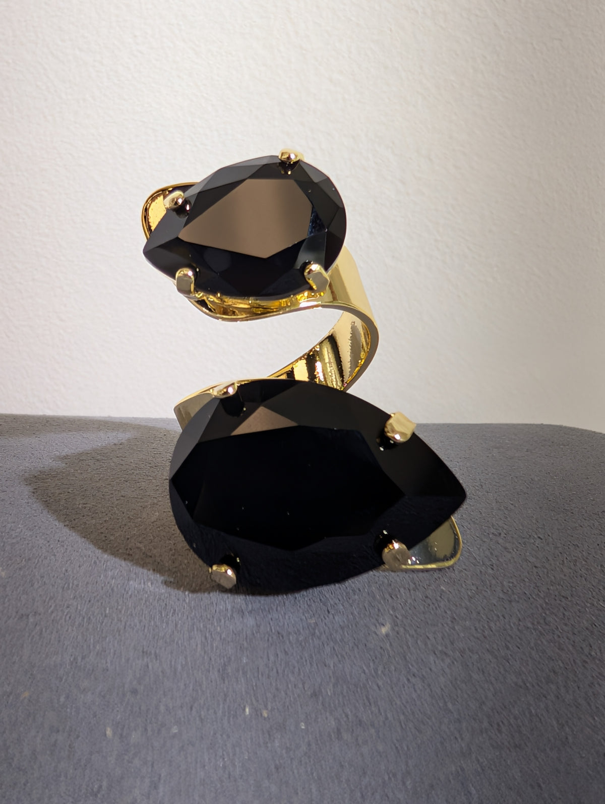 Wafa Midnight Duo Ring — Black, with two teardrop-shaped accents on a curved gold-tone band