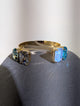 Wafa Ocean Glow Cuff — Blue Mix, with oval and rectangular accents on an open-front gold-tone band