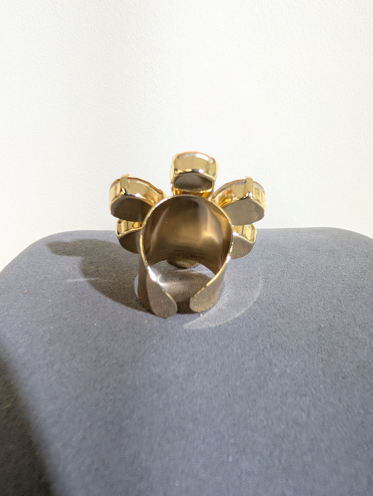 Wafa Petal Sparkle Ring — back view showing open gold-tone band