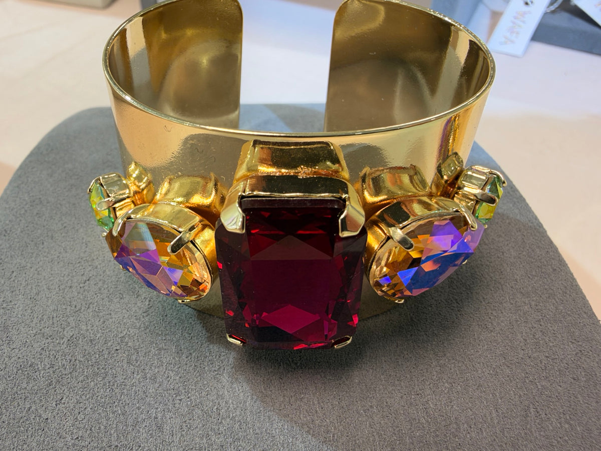 Wafa wide gold-tone crystal cuff with ruby red rectangular center and oval side crystals