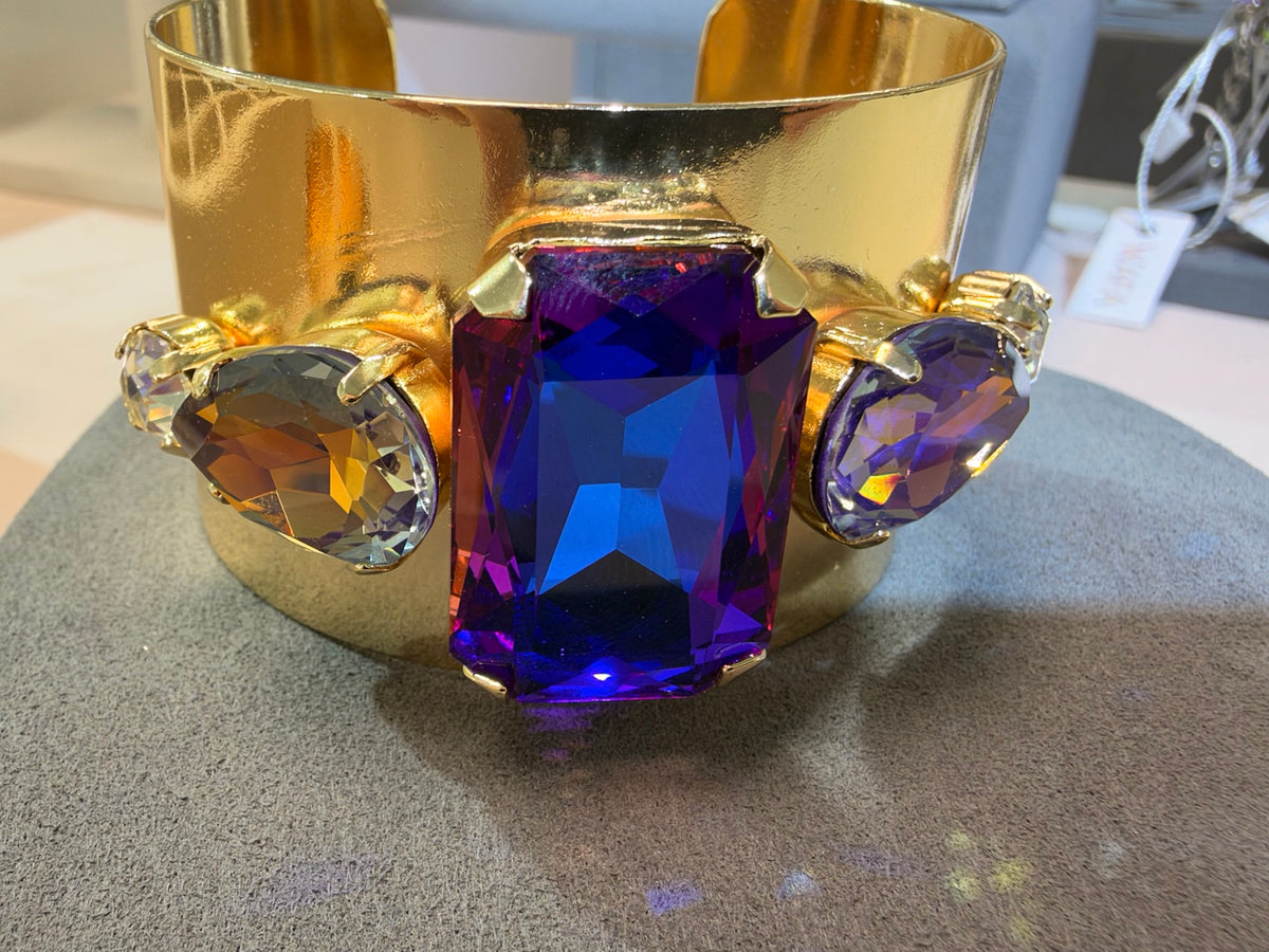Wafa wide gold-tone crystal cuff with purple-blue rectangular center and oval side crystals