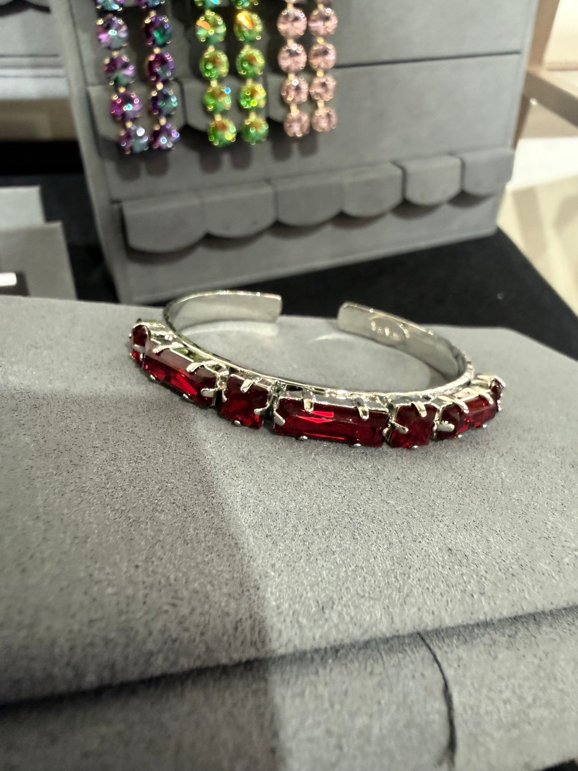 Red crystal open cuff bracelet in silver-tone settings