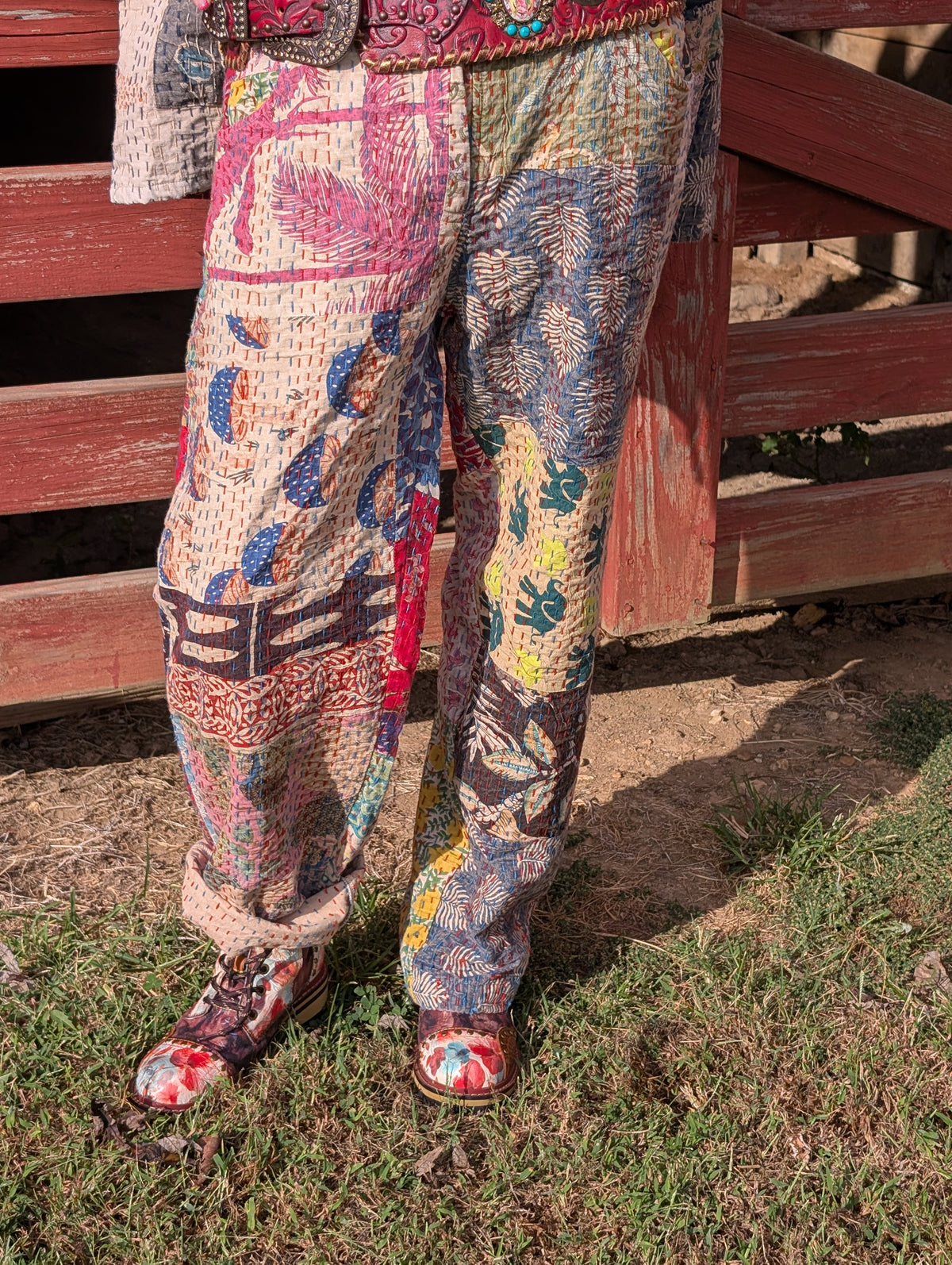 Wandering Soul Kantha Pants — Felecia Bella by paper lace, front view showing colorful patchwork and stitched texture. Belt and shoes are styling accessories.